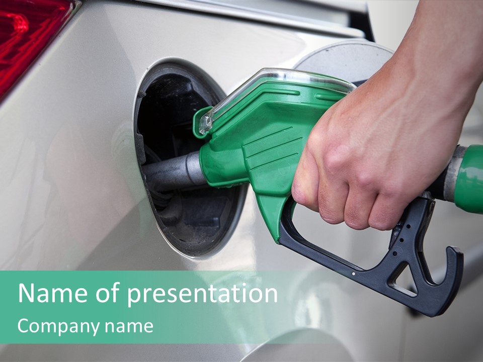 A Person Pumping Gas Into A Car At A Gas Station PowerPoint Template