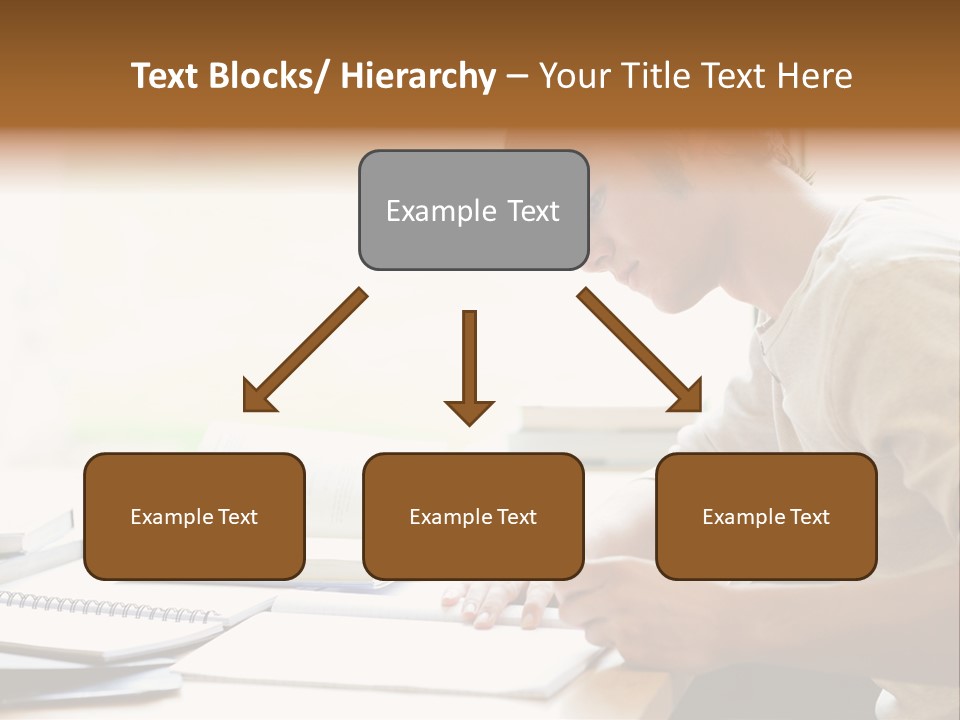 A Man Sitting At A Desk Writing On A Piece Of Paper PowerPoint Template