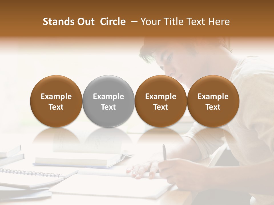 A Man Sitting At A Desk Writing On A Piece Of Paper PowerPoint Template