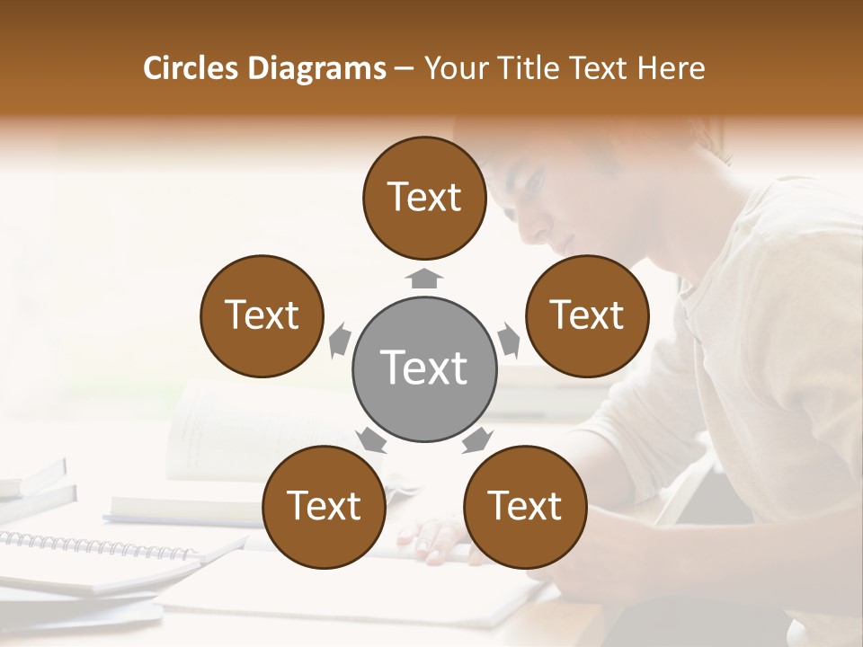 A Man Sitting At A Desk Writing On A Piece Of Paper PowerPoint Template