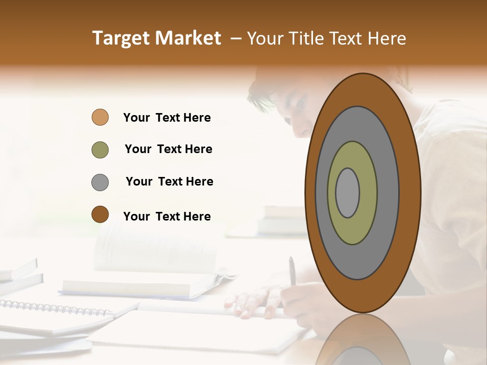 A Man Sitting At A Desk Writing On A Piece Of Paper PowerPoint Template