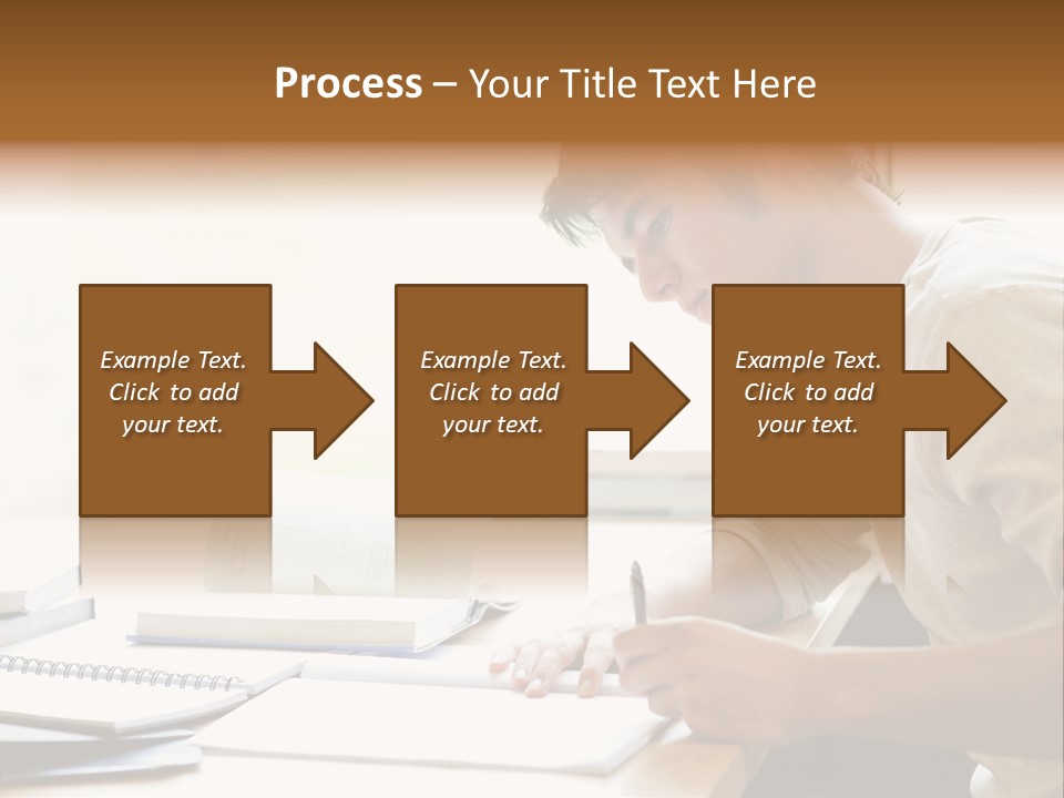 A Man Sitting At A Desk Writing On A Piece Of Paper PowerPoint Template