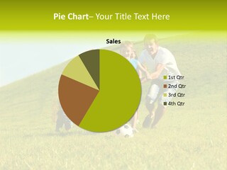 A Family Playing With A Soccer Ball In A Field PowerPoint Template