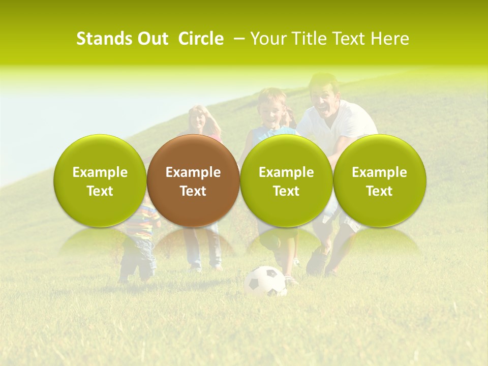 A Family Playing With A Soccer Ball In A Field PowerPoint Template