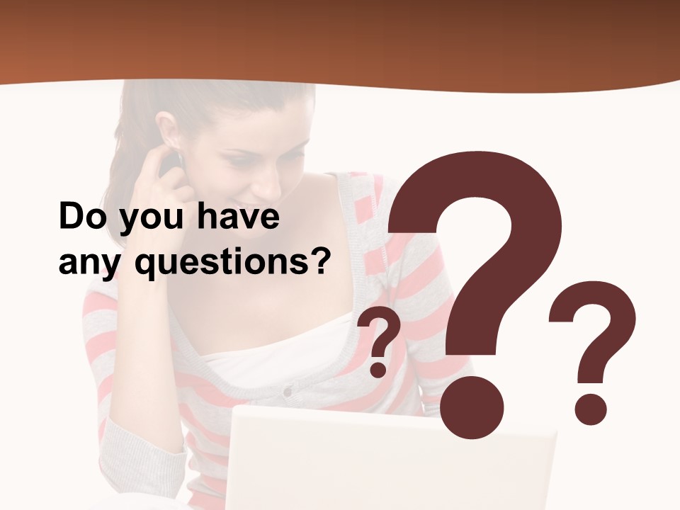 A Woman Sitting On The Floor Using A Laptop Computer PowerPoint Template