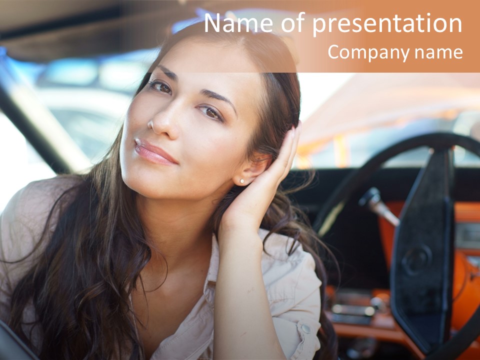 A Woman Sitting In A Car With Her Hand On Her Head PowerPoint Template
