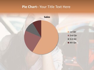 A Woman Sitting In A Car With Her Hand On Her Head PowerPoint Template