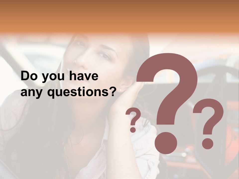 A Woman Sitting In A Car With Her Hand On Her Head PowerPoint Template