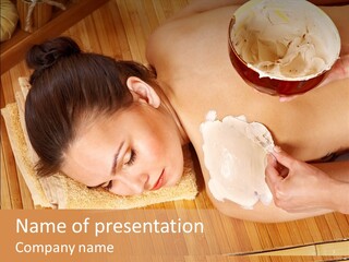 A Woman Getting A Facial Mask On Her Face PowerPoint Template