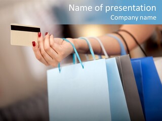A Woman's Hand Holding A Credit Card And Shopping Bags PowerPoint Template