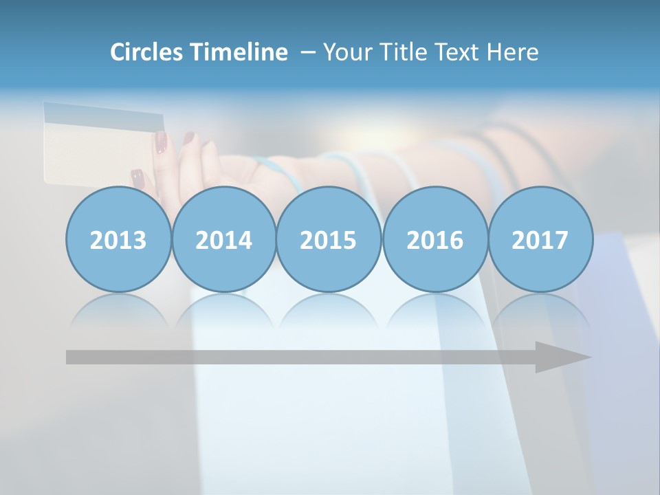 A Woman's Hand Holding A Credit Card And Shopping Bags PowerPoint Template