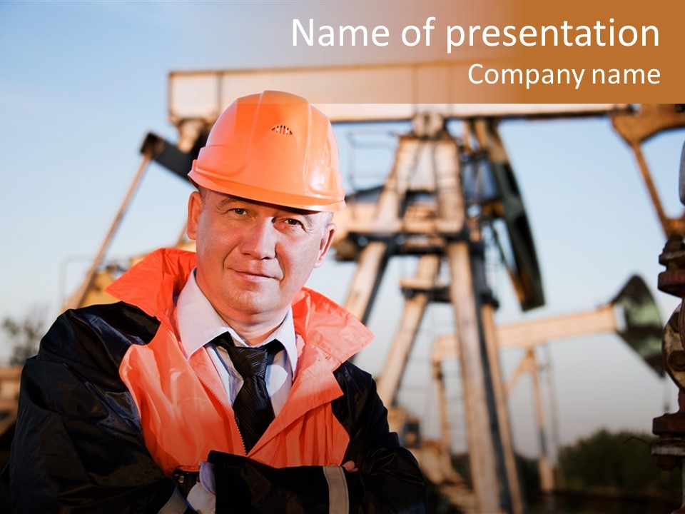 A Man Wearing A Hard Hat And An Orange Safety Jacket PowerPoint Template