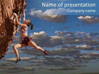 A Woman Climbing Up The Side Of A Cliff PowerPoint Template