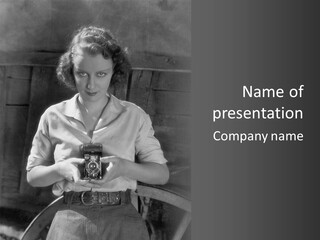 A Black And White Photo Of A Woman Holding A Camera PowerPoint Template