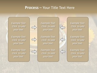 A Cup Of Tea With Dandelions On A Wooden Table PowerPoint Template