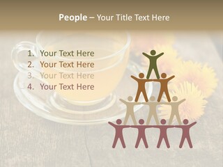 A Cup Of Tea With Dandelions On A Wooden Table PowerPoint Template
