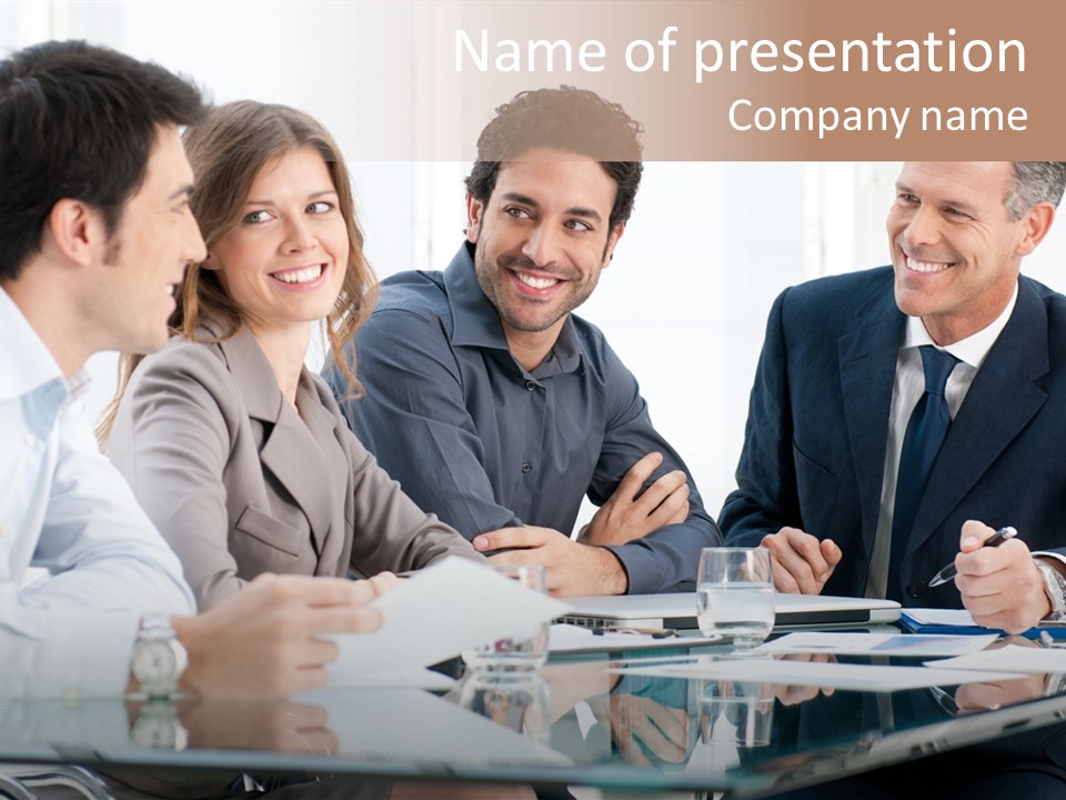 A Group Of Business People Sitting Around A Table PowerPoint Template