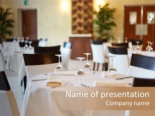 A Restaurant With White Tables And Black Chairs PowerPoint Template