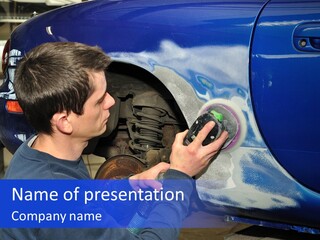 A Man Is Painting A Car With Blue Paint PowerPoint Template