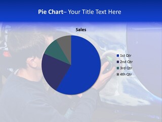 A Man Is Painting A Car With Blue Paint PowerPoint Template