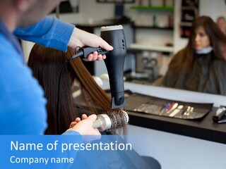 A Woman Blow Drying Her Hair In A Salon PowerPoint Template