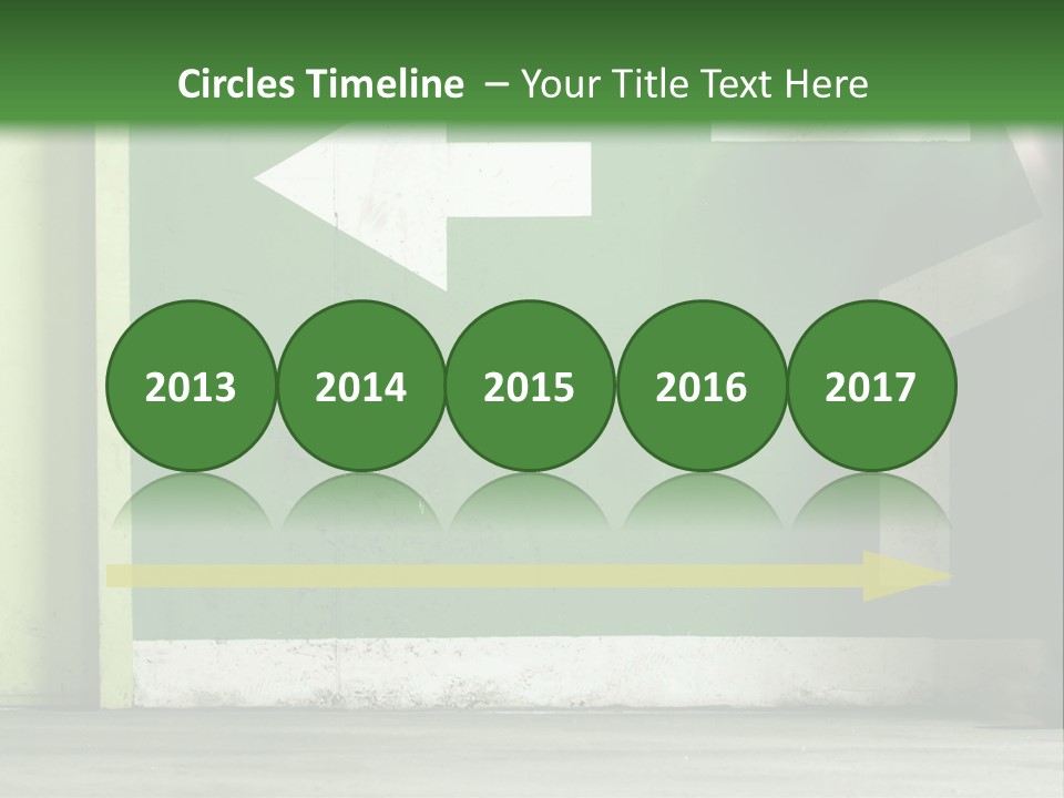 A Man Walking Down A Street Next To A Green Wall PowerPoint Template