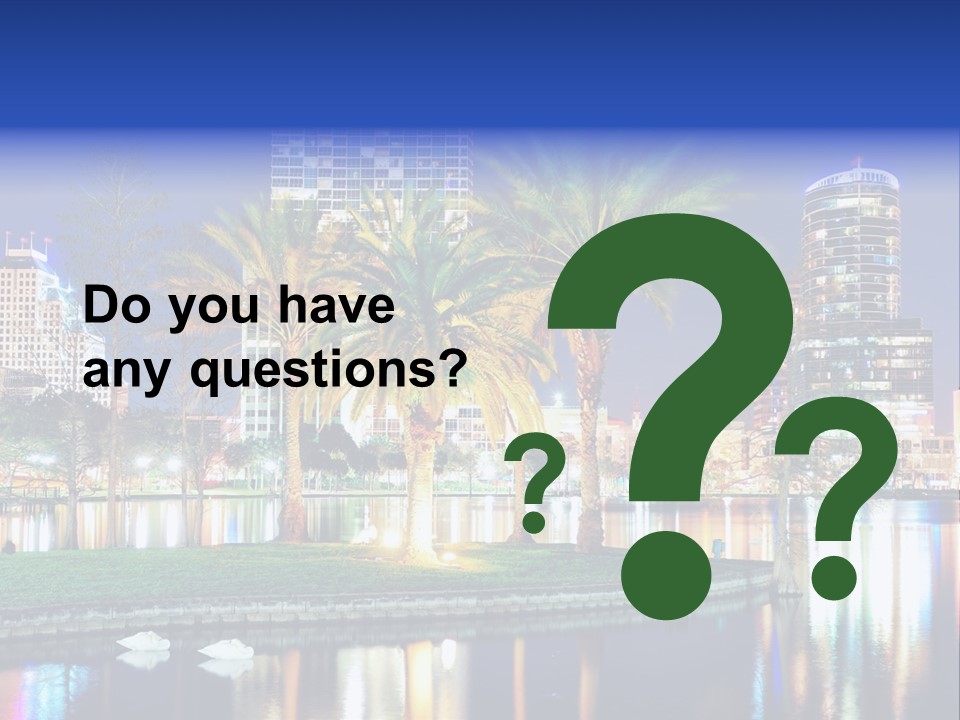 A City Skyline With Palm Trees In The Foreground PowerPoint Template