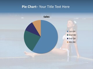 A Beautiful Woman In A White Bikini Sitting On The Edge Of A Swimming Pool PowerPoint Template