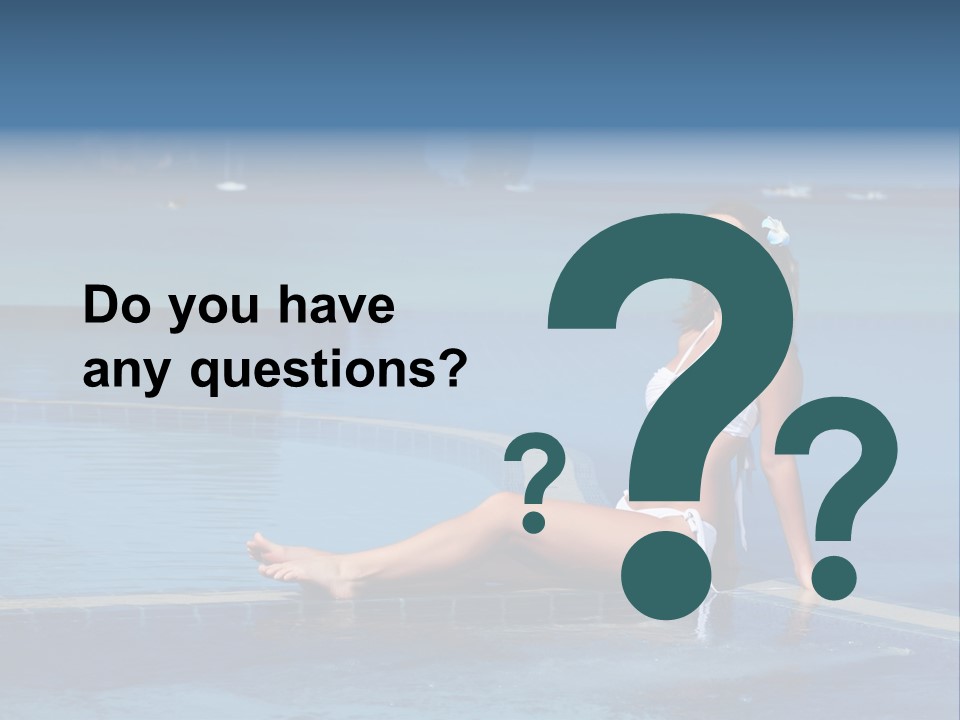 A Beautiful Woman In A White Bikini Sitting On The Edge Of A Swimming Pool PowerPoint Template