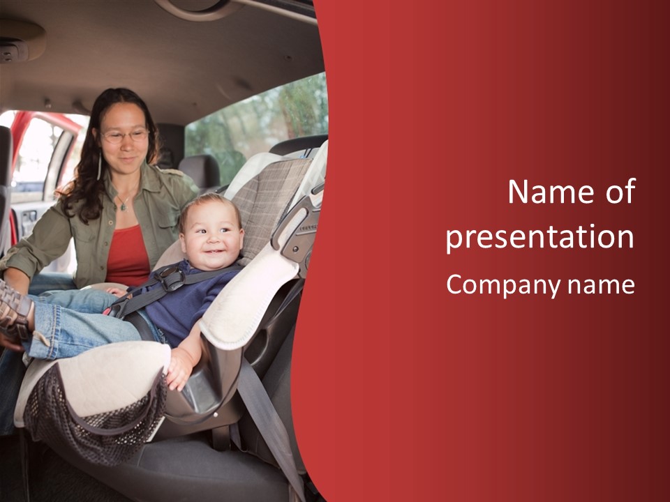 A Woman Sitting In A Car Seat With A Child PowerPoint Template