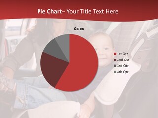 A Woman Sitting In A Car Seat With A Child PowerPoint Template