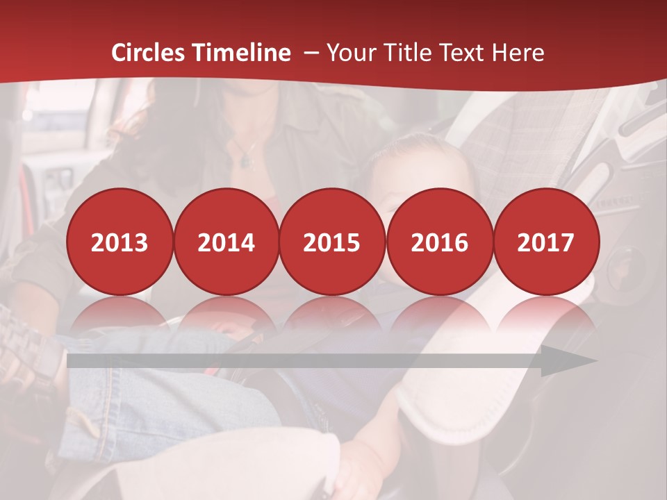 A Woman Sitting In A Car Seat With A Child PowerPoint Template