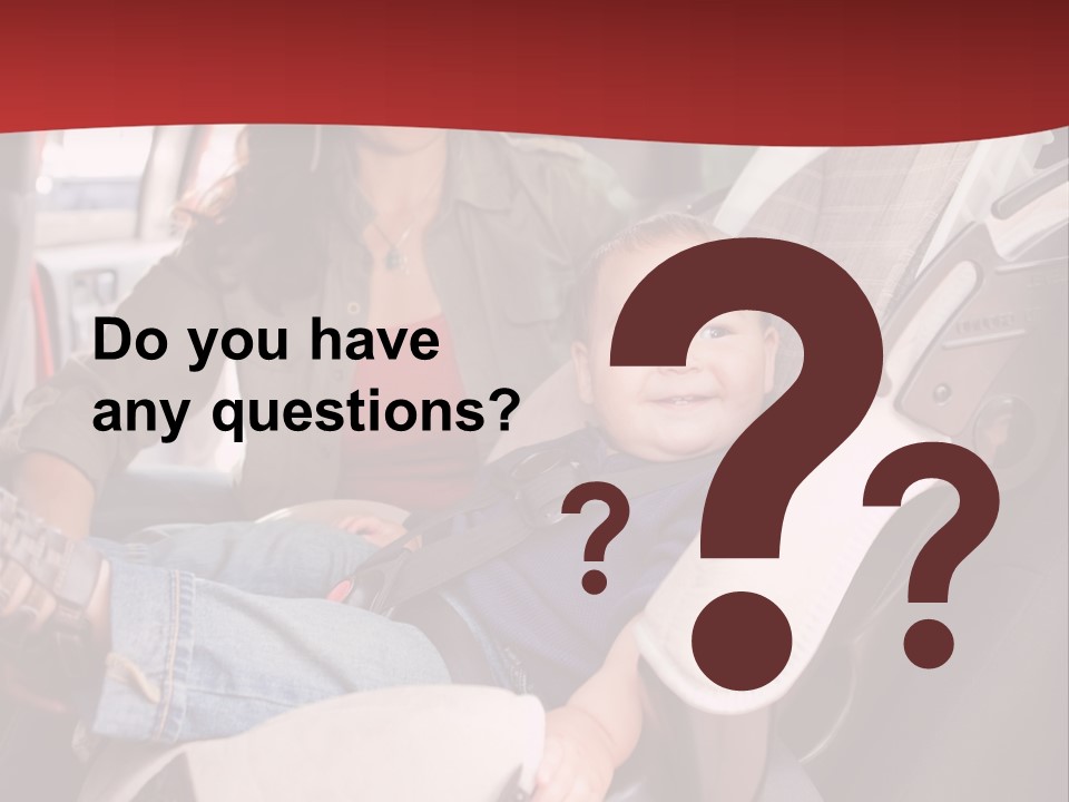 A Woman Sitting In A Car Seat With A Child PowerPoint Template