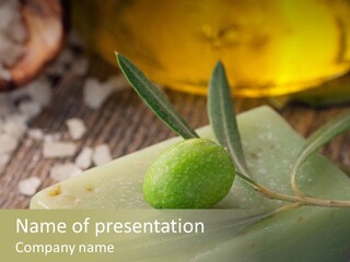 A Piece Of Soap With A Green Olive On It PowerPoint Template