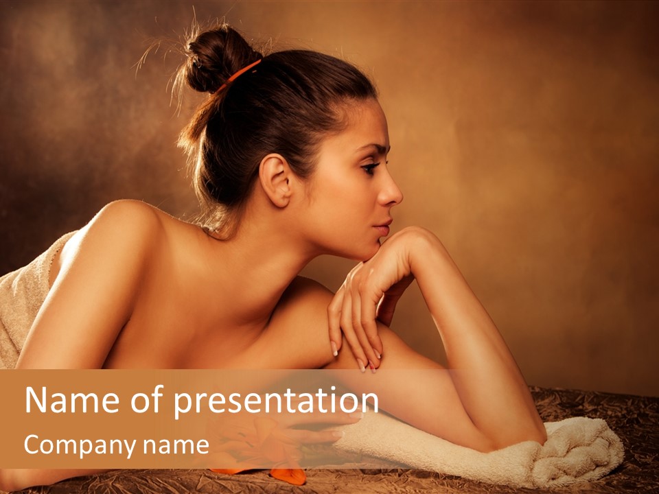 A Beautiful Naked Woman Laying On A Towel PowerPoint Template