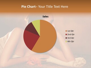 A Beautiful Naked Woman Laying On A Towel PowerPoint Template