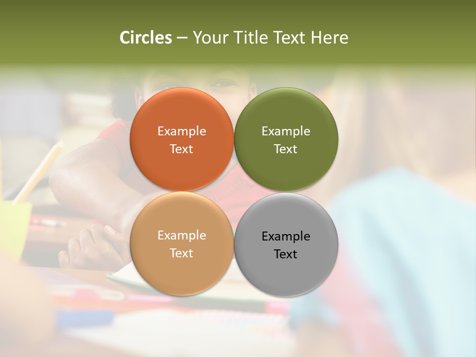 A Young Girl Smiles As She Sits At A Desk PowerPoint Template