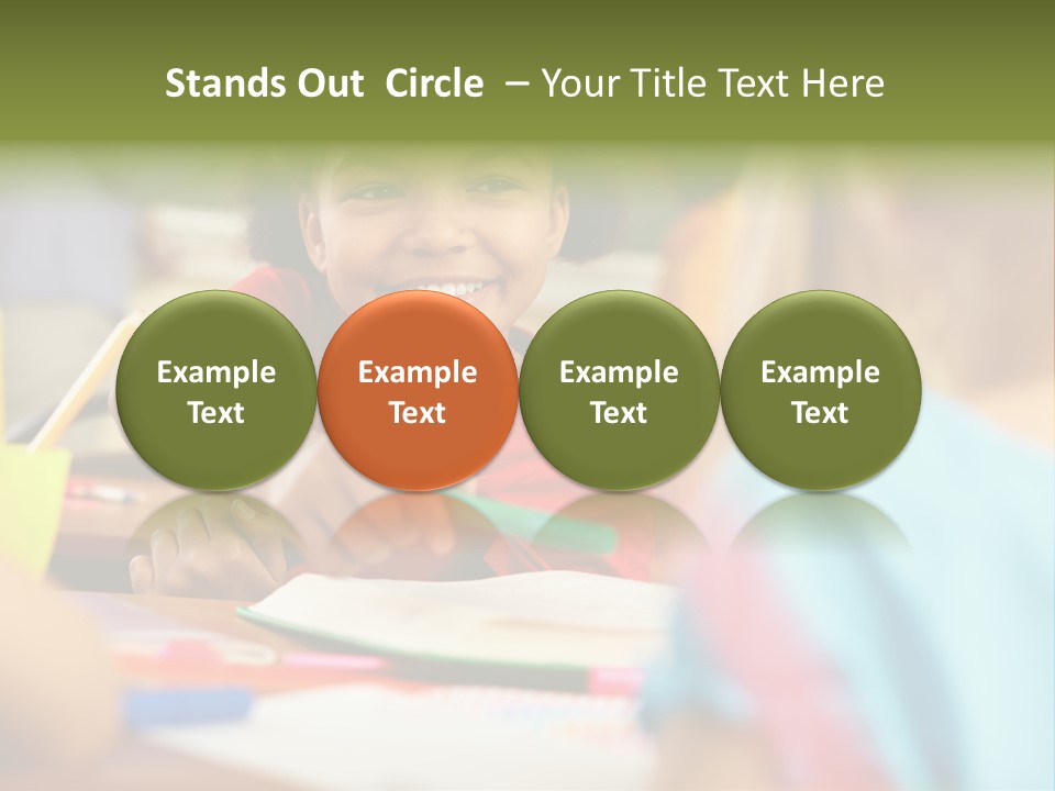 A Young Girl Smiles As She Sits At A Desk PowerPoint Template