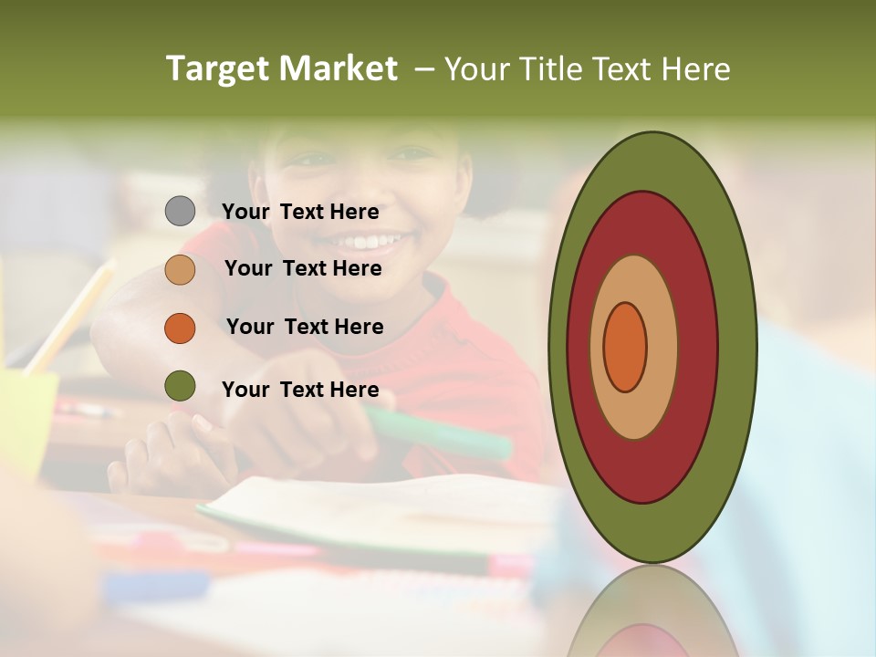 A Young Girl Smiles As She Sits At A Desk PowerPoint Template