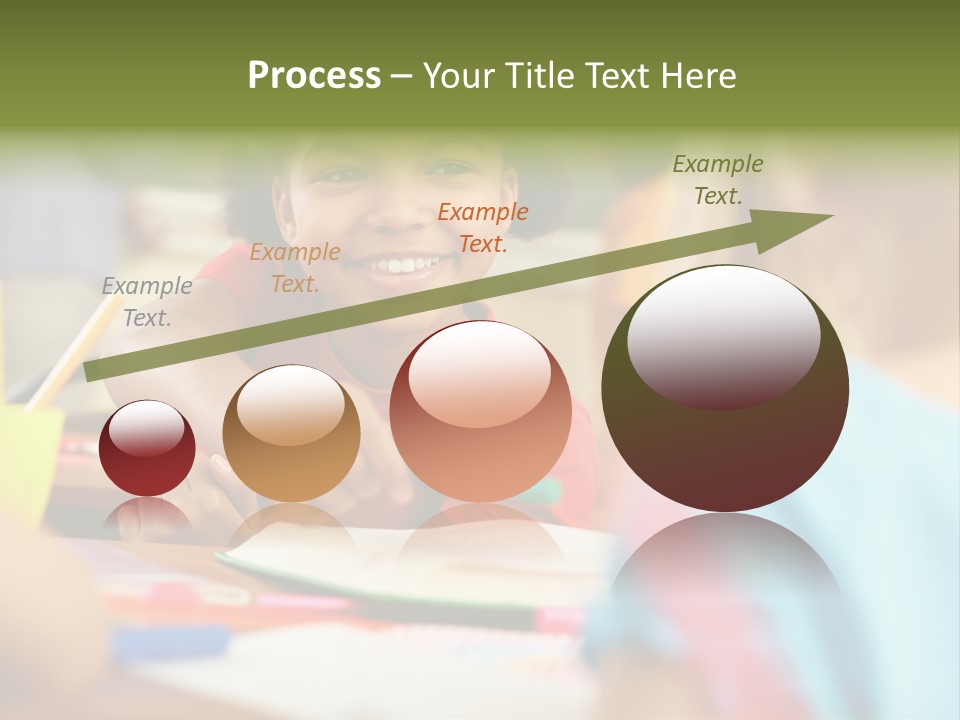 A Young Girl Smiles As She Sits At A Desk PowerPoint Template