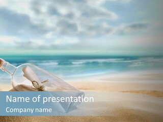 A Message In A Bottle On A Sandy Beach PowerPoint Template