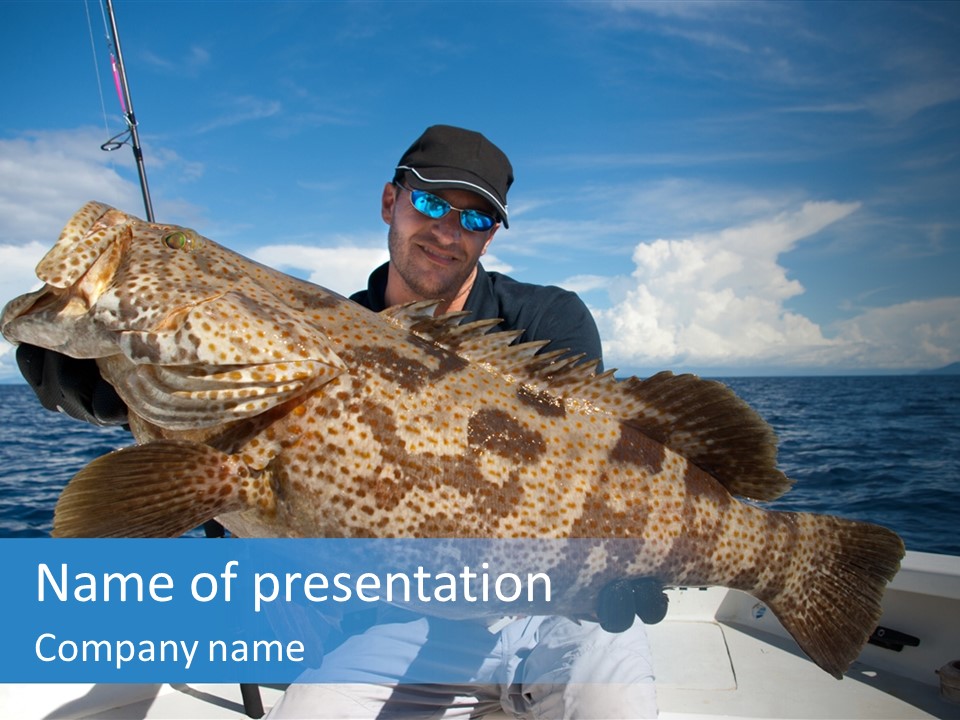 A Man On A Boat Holding A Large Fish PowerPoint Template