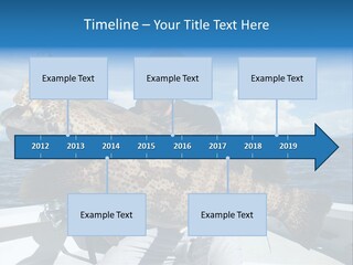 A Man On A Boat Holding A Large Fish PowerPoint Template