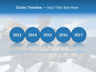 A Man On A Boat Holding A Large Fish PowerPoint Template