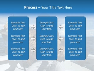 A Man On A Boat Holding A Large Fish PowerPoint Template