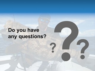 A Man On A Boat Holding A Large Fish PowerPoint Template