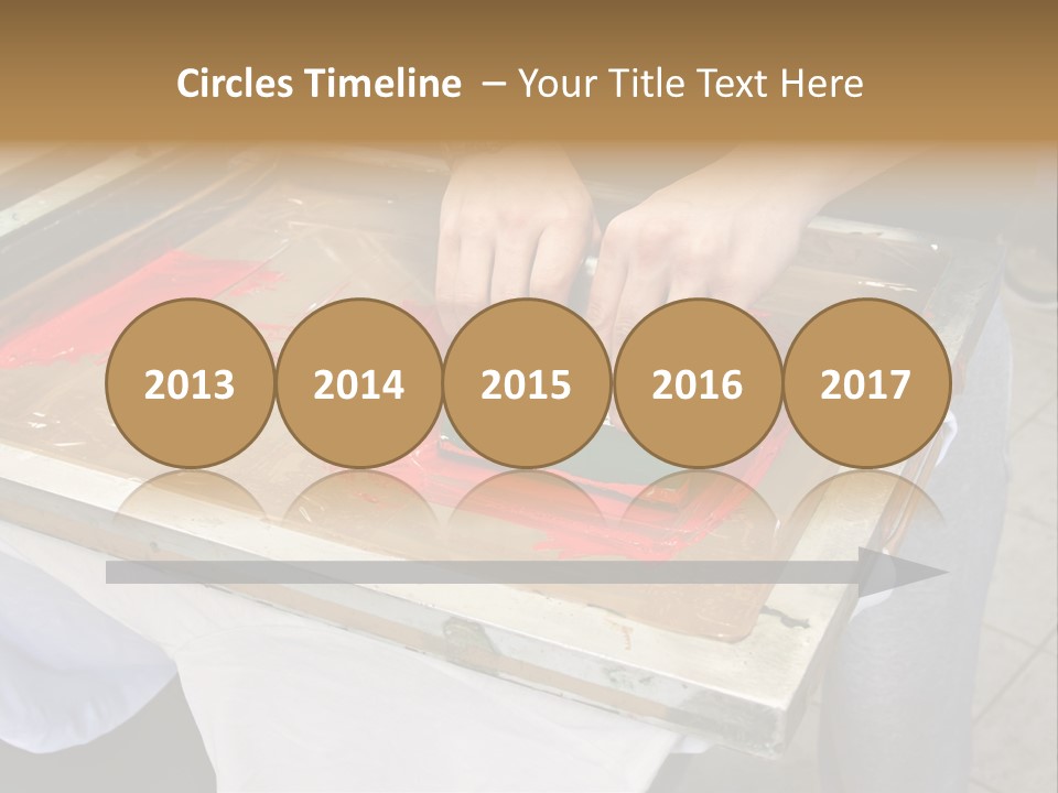 A Person Using A Stamper On A Piece Of Paper PowerPoint Template