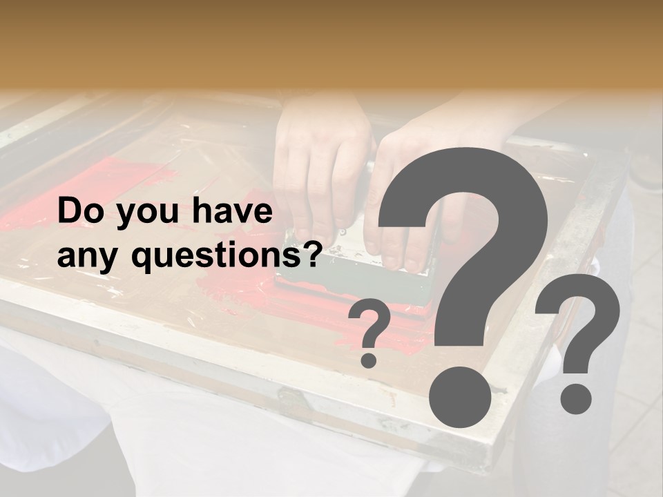 A Person Using A Stamper On A Piece Of Paper PowerPoint Template