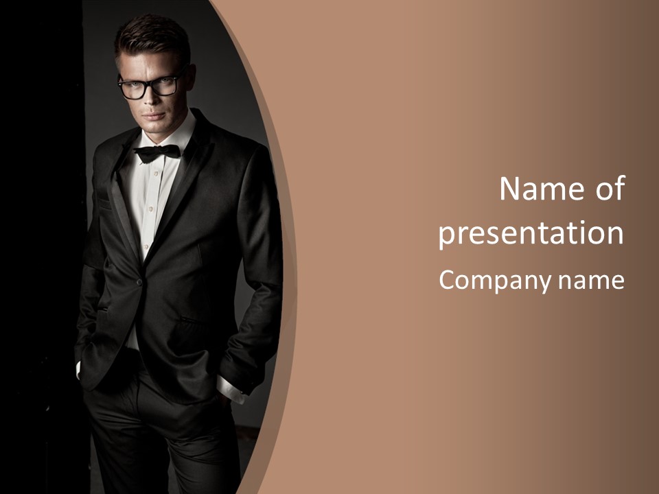 A Man In A Tuxedo Standing In Front Of A Brown Background PowerPoint Template