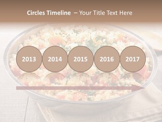A Dish Of Rice With Tomatoes And Parsley PowerPoint Template